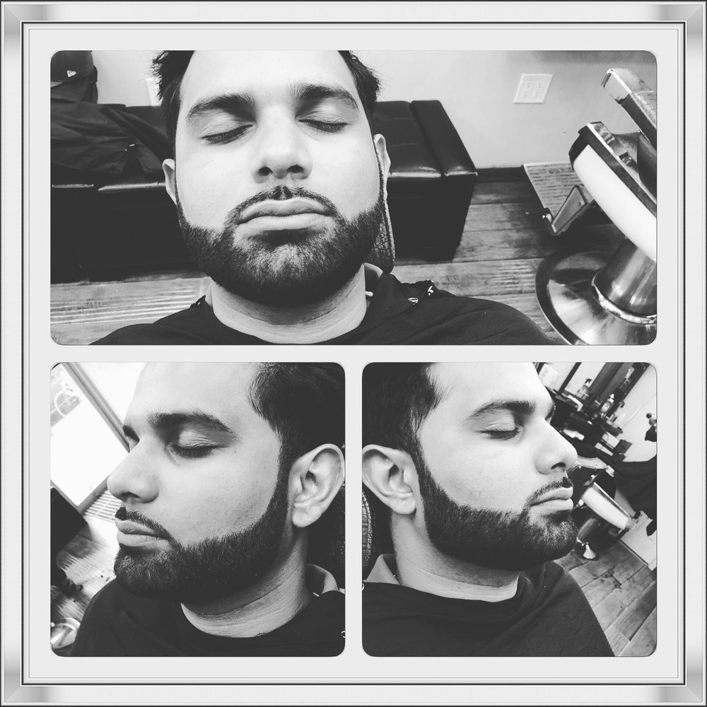 Black and white series of a client beard grooming at Level Two Barbershop